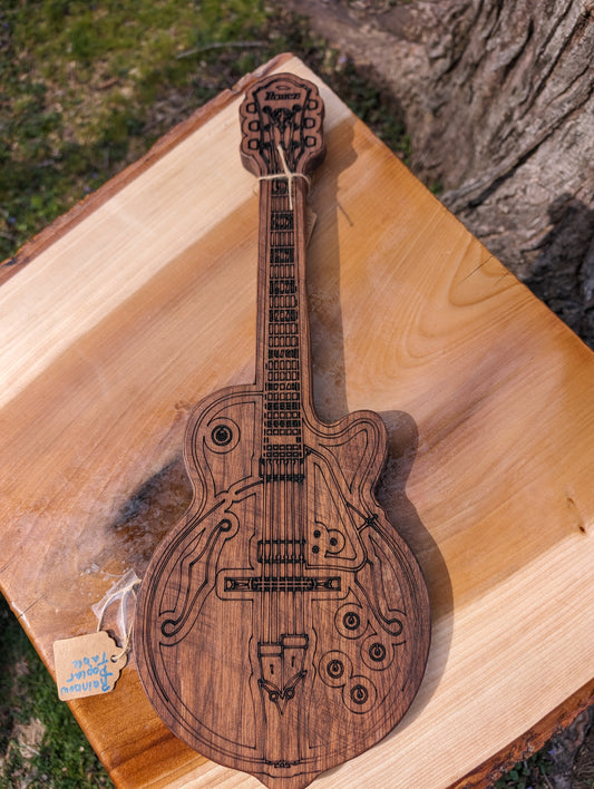 Electric Guitar Cutting Board on walnut